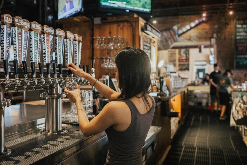 Bartender pouring a beer